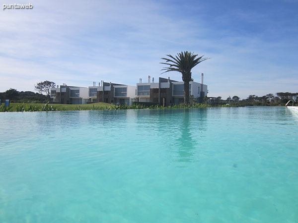 Outdoor pool. In the background, the residences.