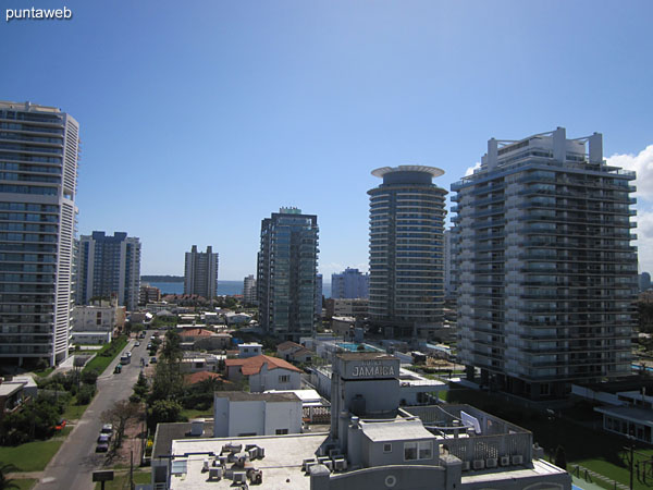 View towards the Mansa beach and the sunset from the main terrace balcony of the apartment.