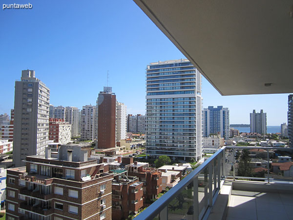 View towards the Mansa beach and the sunset from the main terrace balcony of the apartment.