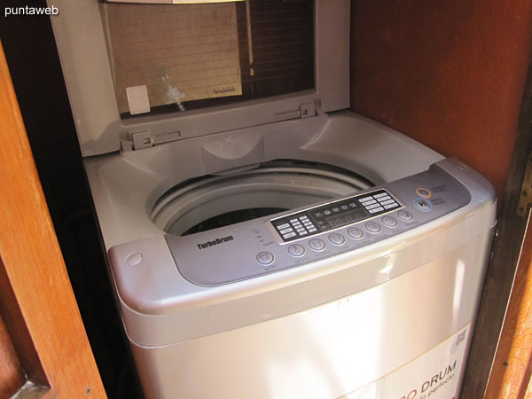 Washing machine. Located in a closed compartment next to the barbecue.