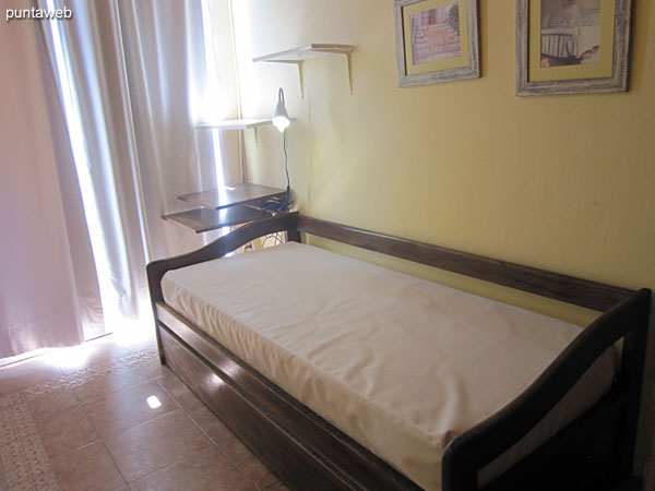 Second bedroom with bathroom. Accessible both from the patio with barbecue and the front of the apartment from the garden.<br><br>Equipped with a sea–bed for two people and air conditioning.