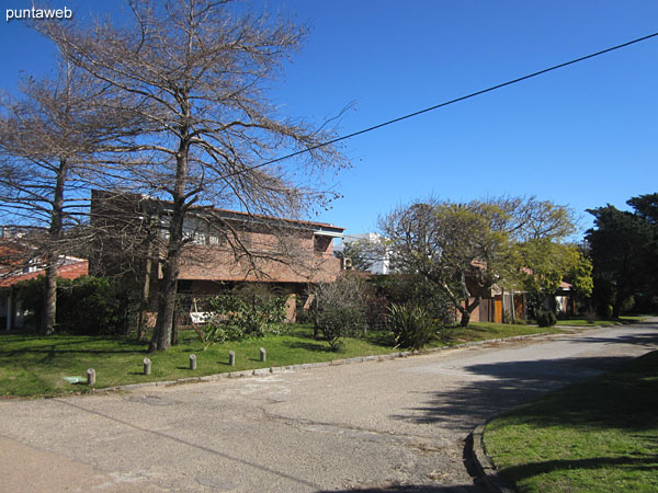 Side street to the building, residential neighborhood environment.