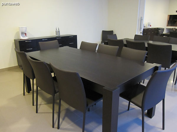 Detail of the tables in the barbecue sector. Made of wood with capacity for eight people seated each.