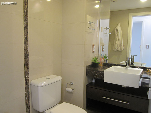 Bathroom of the third suite. Interior, equipped with shower and bath screen.