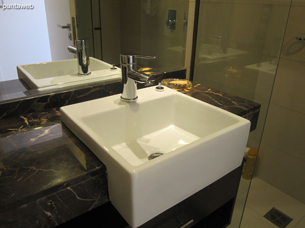 Bathroom of the third suite. Interior, equipped with shower and bath screen.