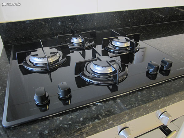 Gas stove with four burners.