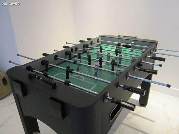 Detail of foosball in the game room for children and teenagers.