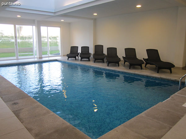 Heated pool under roof. Located at the level of the lobby of the building towards the quiet part of the building.