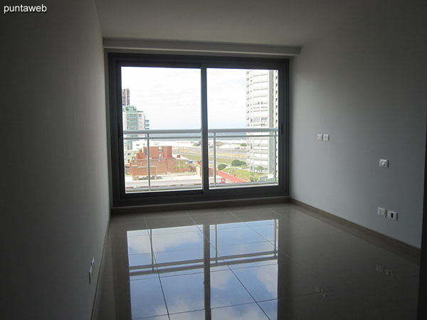 Pallier access to the hallway leading to the bedrooms on the floor with three bedrooms.