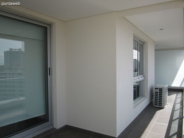 View from the balcony to the master bedroom window.