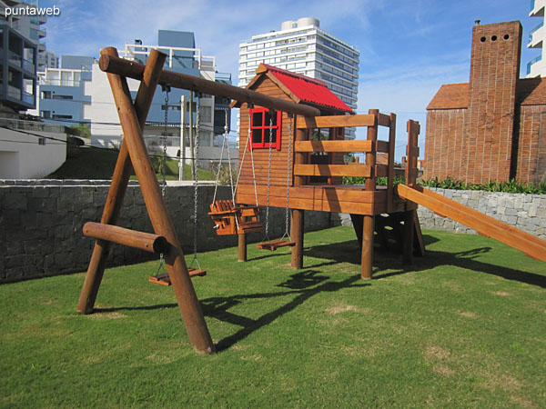 Space for children to play in the garden of the building.