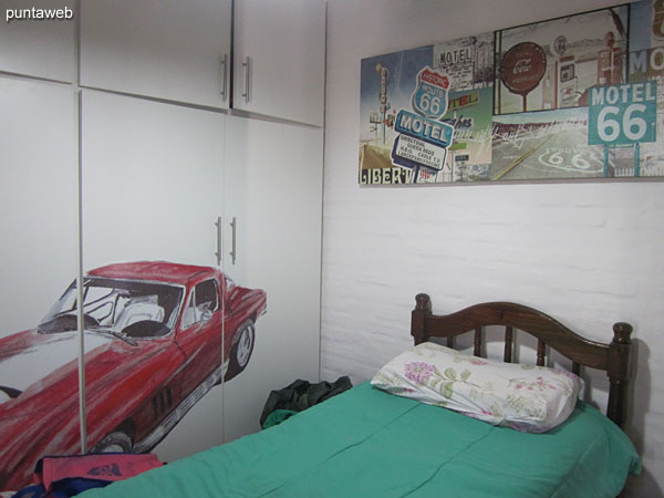 Third bedroom. Located on the upper floor towards the east side. It has a single bed.