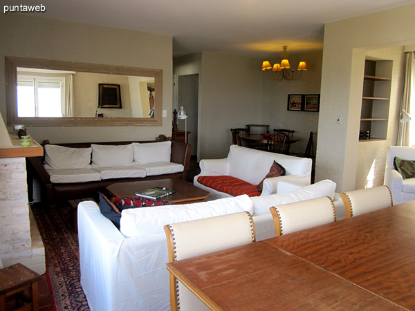 Detail dining space on the east side of the room. <br><br>At the bottom of the image to the left, small desk.