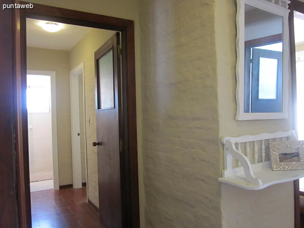 Overview of the hallway leading to the three bedrooms. <br><br>Located on the left and opposite the entrance to the kitchen.